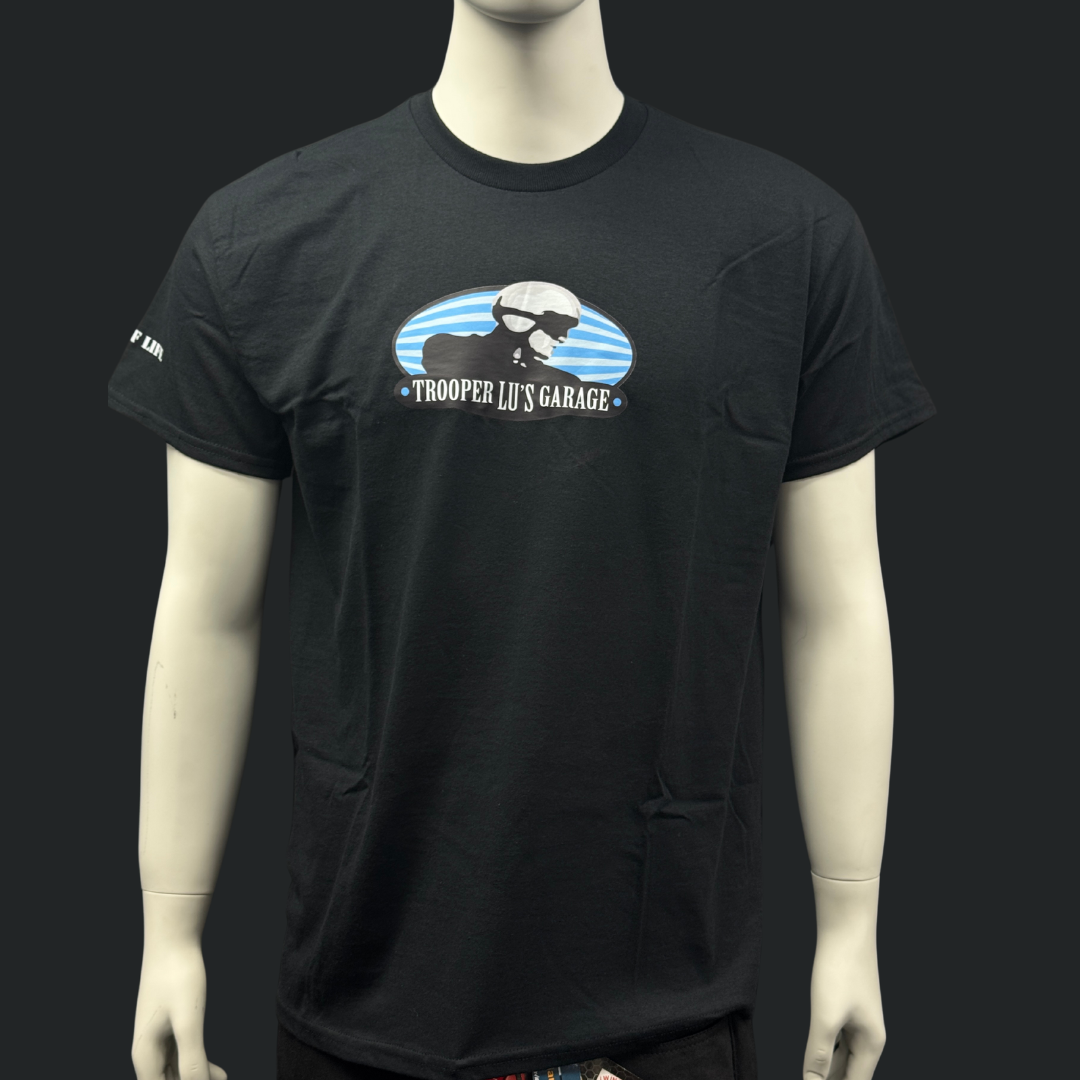 The TROOPER LU T-SHIRT - MEN'S is displayed on a mannequin, featuring a skull in sunglasses and helmet with "Trooper Lu's Garage" printed across the chest.