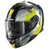 A black and neon yellow motorcycle helmet with visor and aerodynamic design, featuring the brand "Shark" on the side.