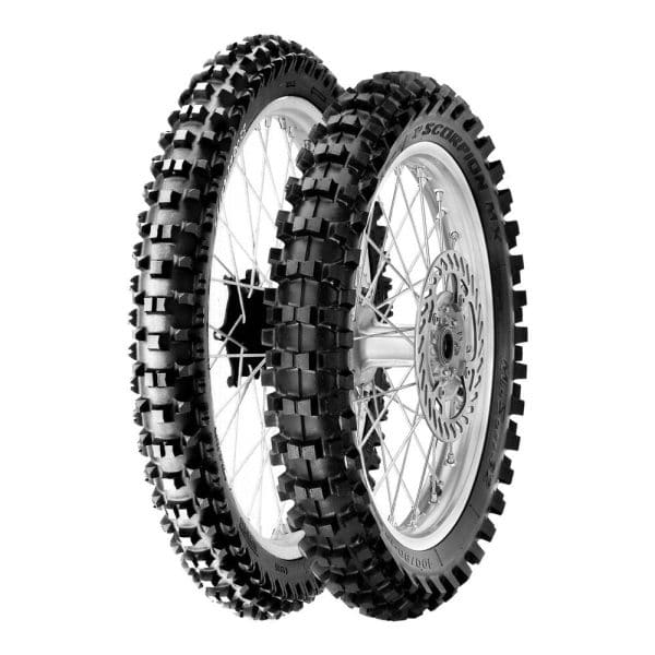 Two PIRELLI SCORPION XC MID SOFT FRONT TYRES 80/100-21 51R MST with knobby tread patterns stand side by side on a white background, showcasing the durability and innovation PIRELLI is known for in high-performance terrains.