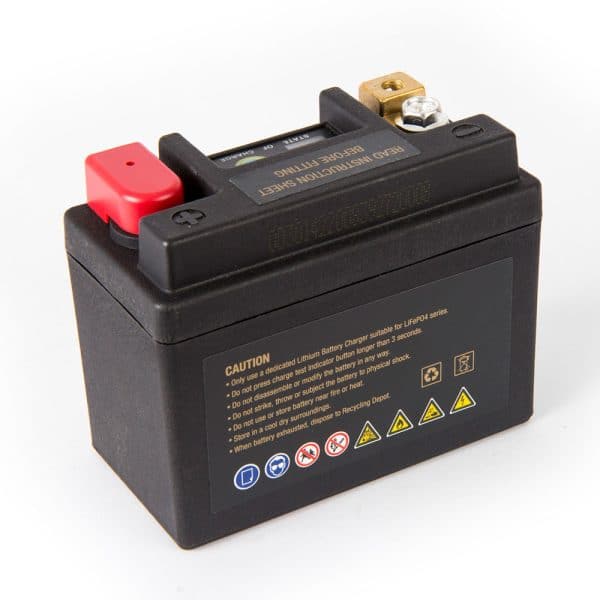 The MOTOCELL LITHIUM GOLD MLG7L, 24WH BATTERY is a sleek black lithium battery with red and brass terminals, prominently displaying caution and safety symbols on the side, engineered by Motocell for optimal performance and reliability.