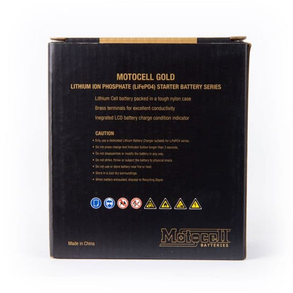 Box of MOTOCELL LITHIUM GOLD MLG7L, 24WH BATTERY with detailed product information, including caution instructions and standout features.