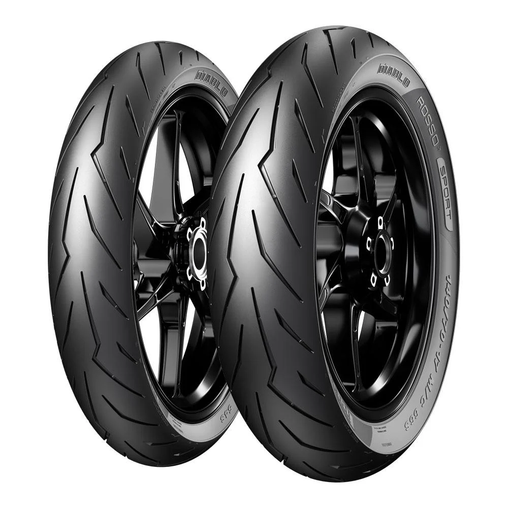 Two Pirelli Diablo Rosso Sport Front Tyres, with patterned tread and standing upright against a white background, exemplify precision design.