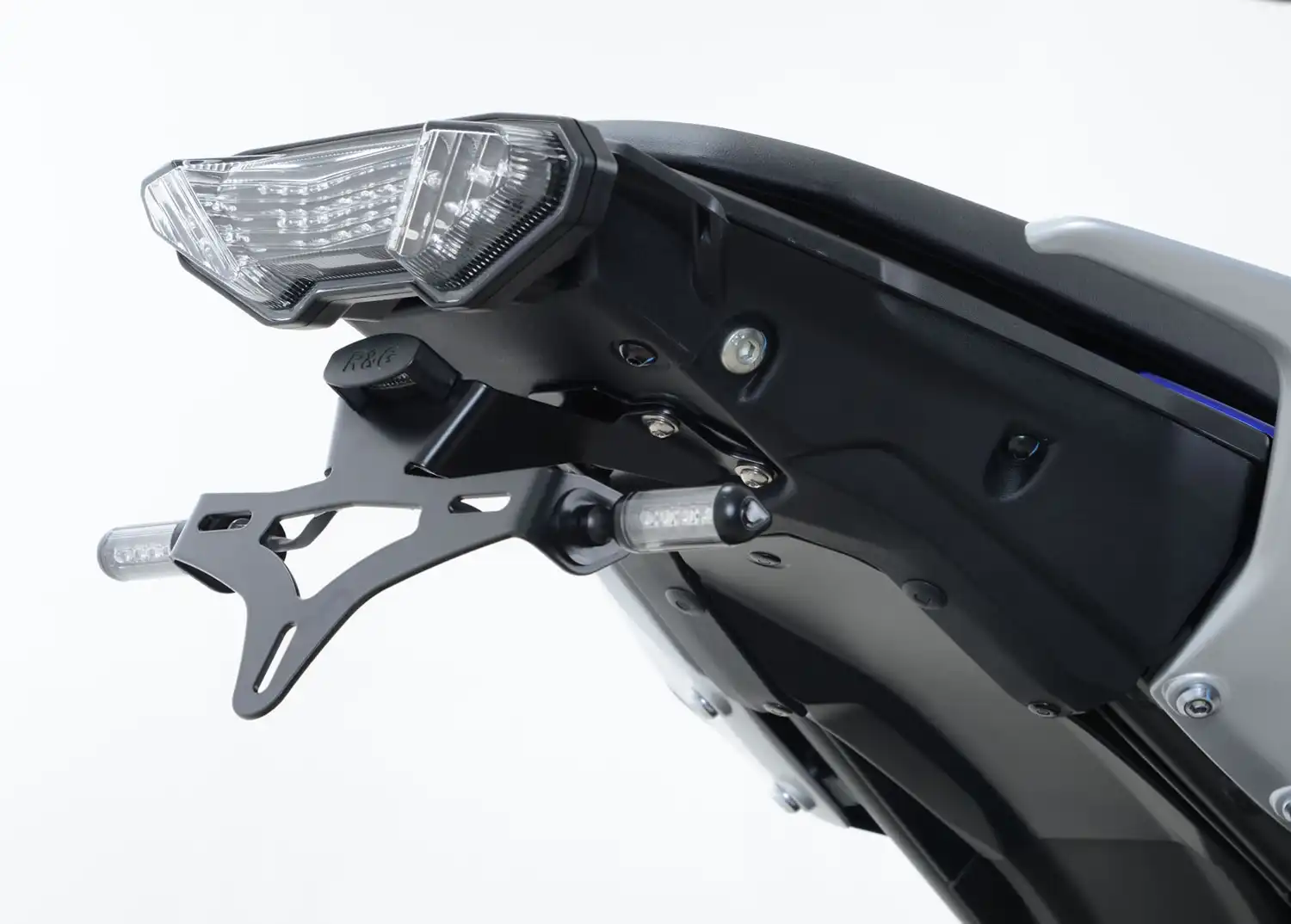 Close-up of an R&G Tail Tidy for 2016-2020 MT07/Tracer 700, showing the rear LED taillight assembly with a license plate holder and turn signals against a neutral background.