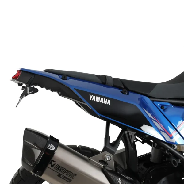 Close-up of a blue motorcycle's rear section featuring a Yamaha logo and an R&G Tail Tidy for the 19-24 Tenere 700, along with an Akrapovic exhaust.