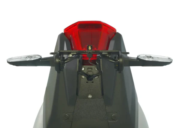 Rear view of the MUSTARD MT-07 2025 Tail Tidy - 186mm showcasing the motorcycle's seat and tail with exposed frame, red light cover, and side indicators against a neutral background.