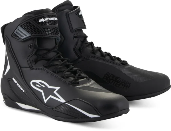 ALPINESTARS FASTER V4 BOOTS - BLACK/WHITE feature a high ankle design with laces, prominent logos, and sleek protective elements.